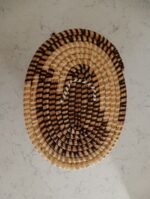 Oval basket in earthy tones - Image 2