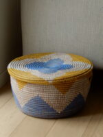 Medium storage basket with yellow/blue color pattern.