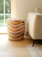 Basket with flat lid and wavy multicolor pattern