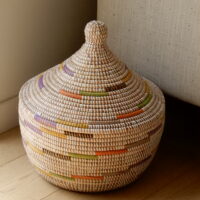 Medium storage basket with colored, spiral-shaped color tones